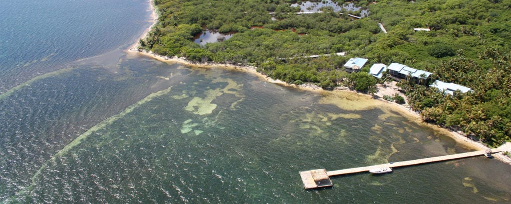 Itza Lodge Belize aerial view on Lighthouse Reef Atoll before becoming Itza Resort