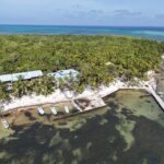 Itza Resort Belize aerial view on Lighthouse Reef Atoll in 2025